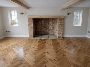 Another space transformed with expertly fitted oak herringbone flooring — where craftsmanship meets premium interior design.