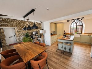 This bespoke kitchen and dining area combines natural textures with precision carpentry — from solid wood worktops and custom storage to seamless finishes that elevate the entire space. We don’t just fit kitchens — we transform homes with attention to detail, structure, and flow.