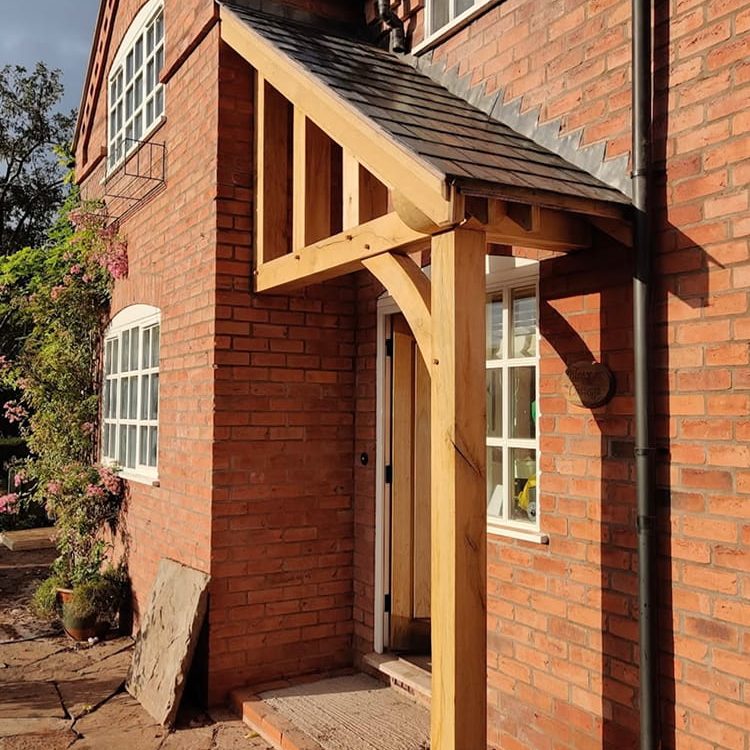 Bespoke oak entrance canopy Handcrafted timber detailing Built to elevate curb appeal Creative Finish Carpentry Coventry & Warwickshire