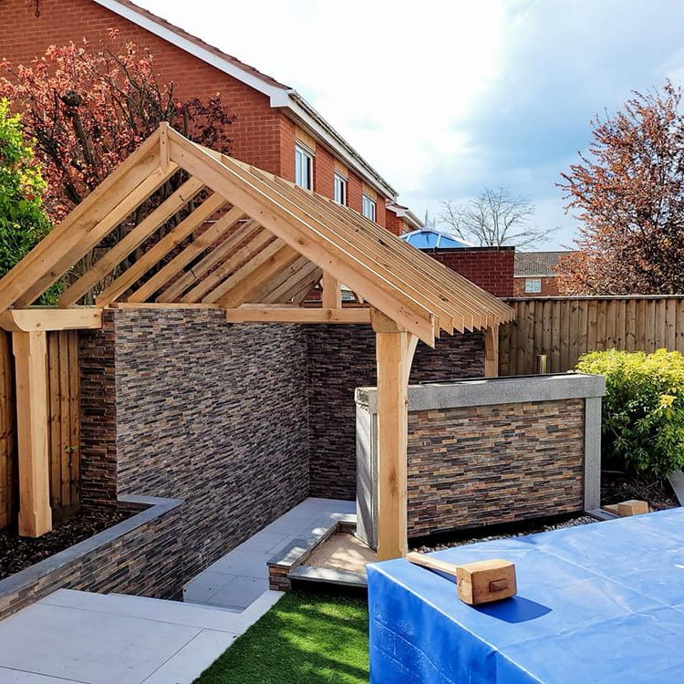 A bespoke outdoor kitchen timber roofing